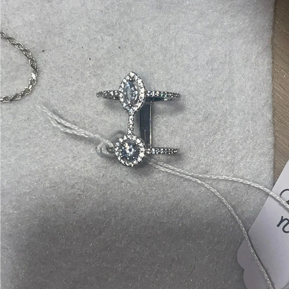 DOUBLE CONNECTED RING
STERLING SILVER MARQUE AND BRILLIANT
CUT WHITE SAPPHIRE 8 - Picture 5 of 9